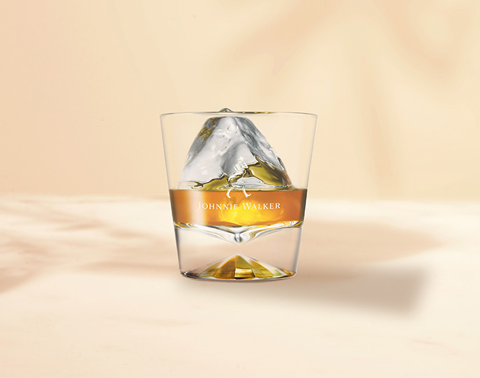 Johnnie Walker in a Chilled glass with a BIG ice cube